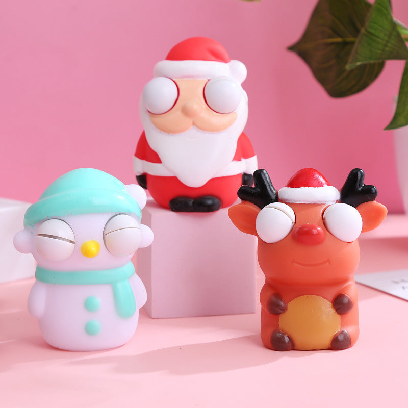 Squinting Christmas toys squeezing Christmas toys pinching and laughing toys staring and relieving stress