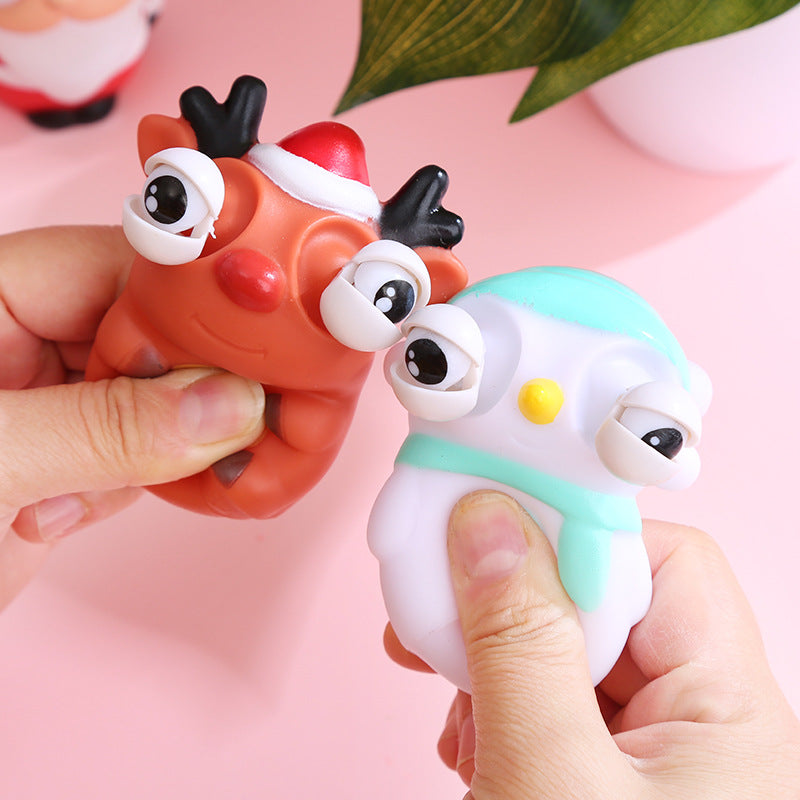Squinting Christmas toys squeezing Christmas toys pinching and laughing toys staring and relieving stress